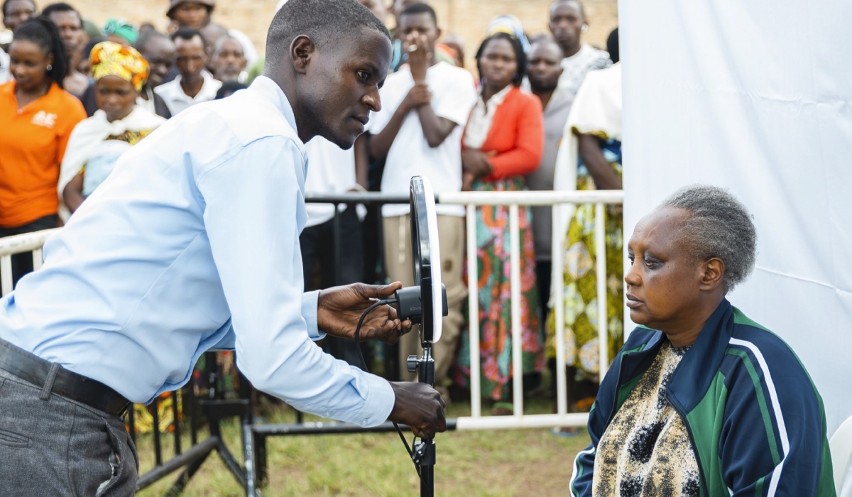 NIDA staff takes pictures of residents during the launch of the nationwide identity verification and photo registration exercise for Single Digital ID on Tuesday,  October 28. Courtesy