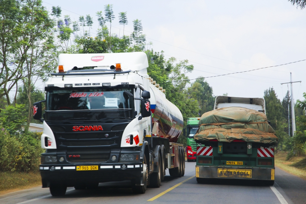 Some cross-border trucks in Kabuga in Gasabo. Truck drivers have expressed concerns over restrictions that prevent them from operating on Kigali’s roads during certain hours. Photo Craish Bahizi