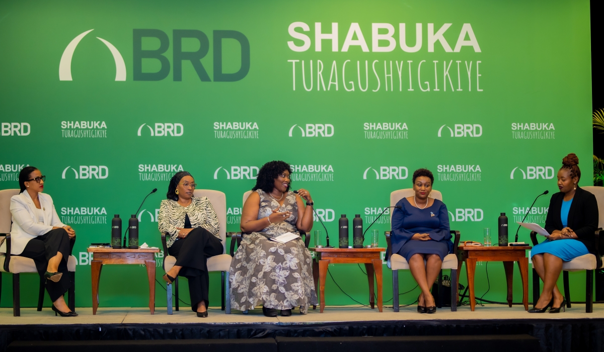 Panelists engage in a discussion at the launch