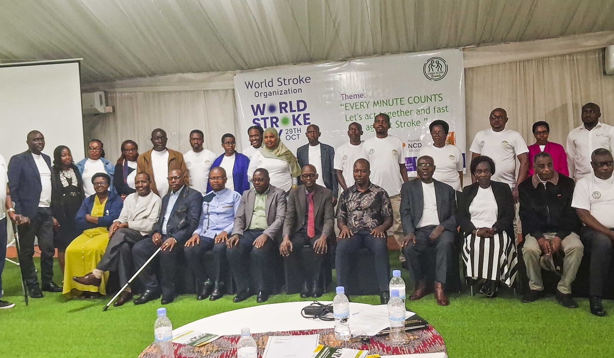 Participants pose for a group photo during the commemoration of World Stroke Day on Wednesday, October 29.