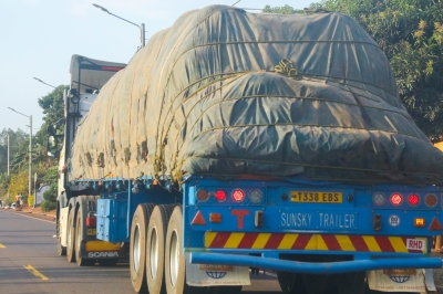 A truck drives through Kirehe District in Eastern Province, Rwanda, transporting goods from Tanzania. Photo by Craish Bahizi