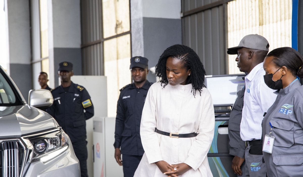 Environment Minister Bernadette Arakwiye tours a gas emission testing demonstration at the Remera Automobile Inspection Centre on Friday, November 1. Courtesy