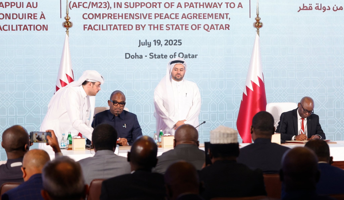 Representatives of the Congolese government and the AFCM23 movement sign the declaration of principles in Doha on July 19. File