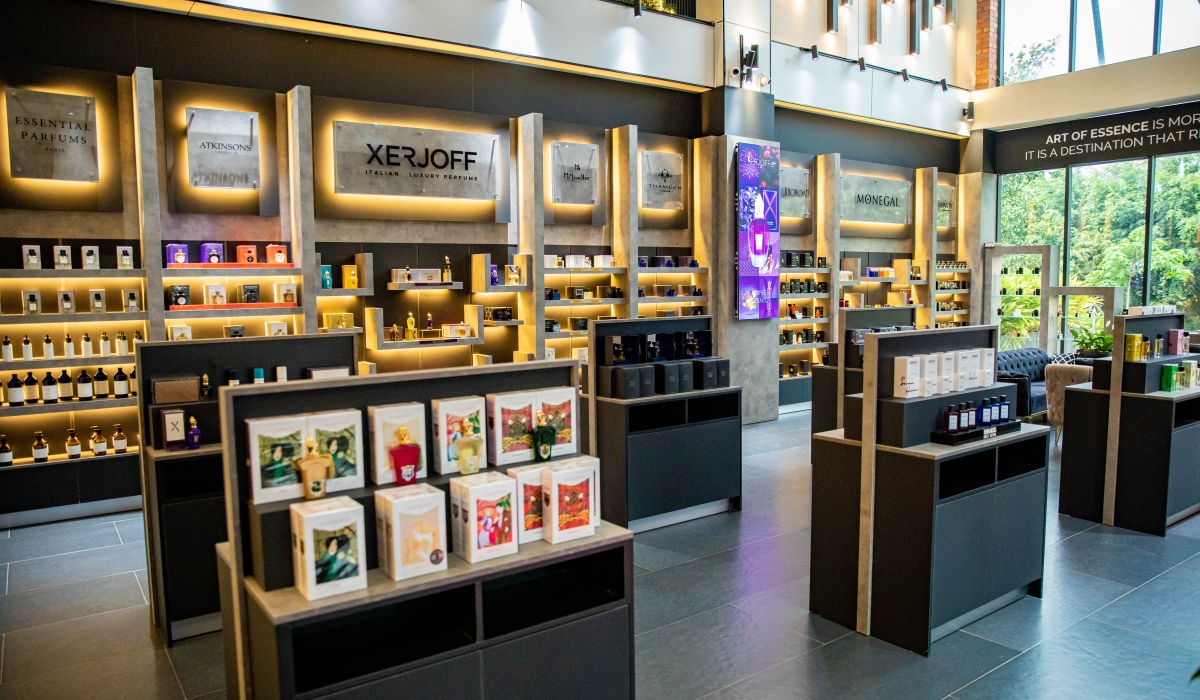 The interior of Art of Essence blends modern minimalism with quiet luxury, letting each perfume bottle double as an art piece