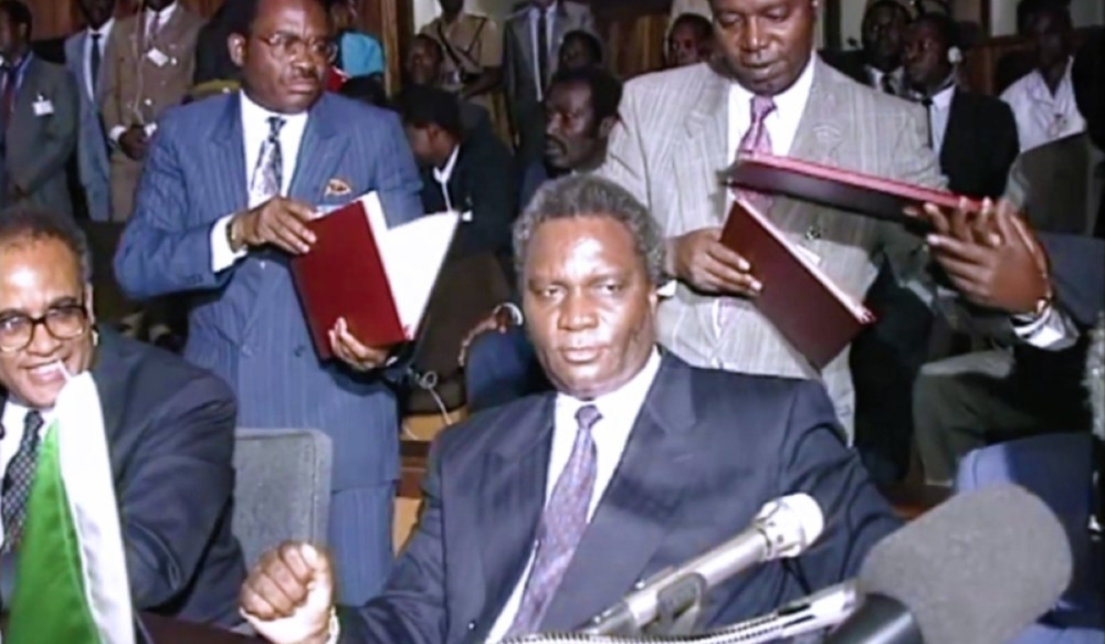 President Juvénal Habyarimana signs the peace agreement in Arusha, Tanzania.