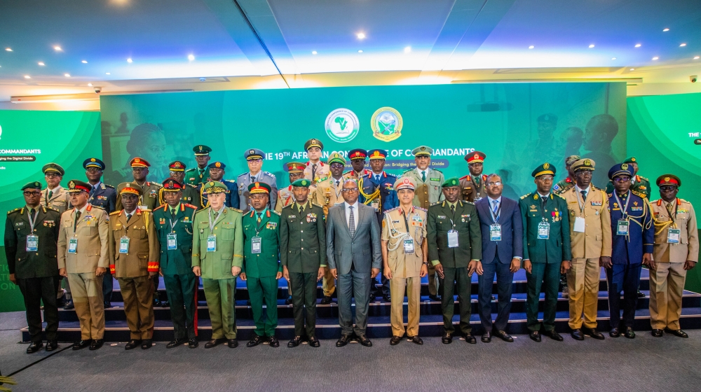 Minister Marizamunda poses for a photo with commandants and senior officers from 24 countries across the continent.