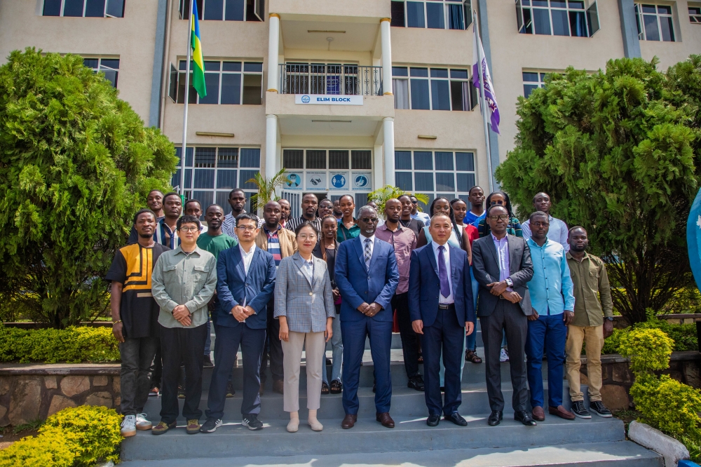 Officials, trainers and participants pose for a photo after the opening session of the workshop in Kigali. Photos by Craish BAHIZI