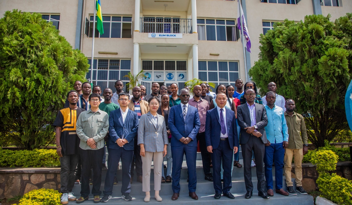 Officials, trainers and participants pose for a photo after the opening session of the workshop in Kigali. Photos by Craish BAHIZI