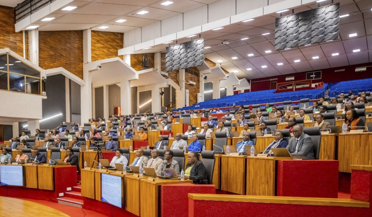 MPs follow Barnabé Sebagabo Muhire, Acting Chairperson of the the National Public Service Commission, as he addresses  a joint session of parliament on November 12. Courtesy