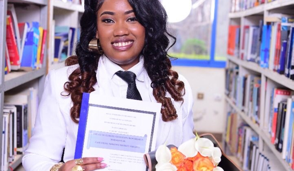 Ophélie Emanoela, a Malagasy student, poses for a picture soon after defending her final thesis project at Kigali Independent University, in October 2025.