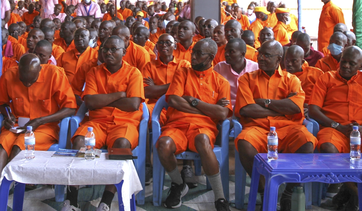 Inmates follow Chief Justice Domitilla Mukantaganzwa's remarks while explaining the plea bargaining’s role in promoting restorative justice.  Courtesy