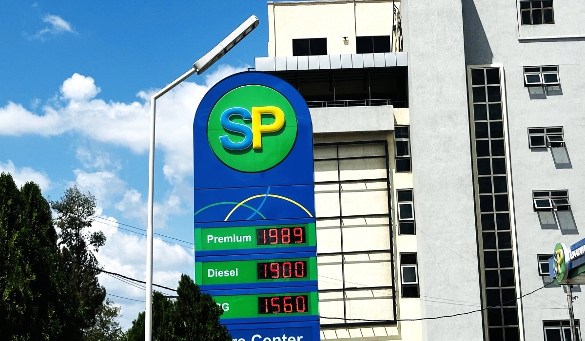 A sign post at SP Nyarutarama displays new fuel prices. Photo by Confiance Mugisha