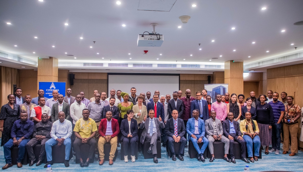 CIMERWA officials, stakeholders, and distributors pose for a group photo during the customer engagement meeting in Kigali on November 14. Photos by Craish Bahizi.