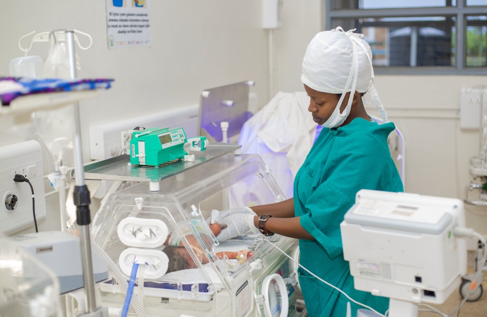 A nurse checks on a premature baby in the neonatal intensive care unit at Kibungo Hospital. Courtesy.