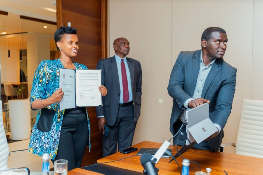 Chief Executive Officer Patricie Uwase and Jamaica’s Chief Justice Bryan Sykes during the signing ceremony in St Andrew in Jamaica. Photo courtesy