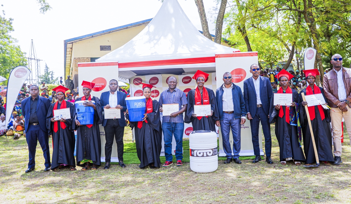 Officials and graduates pose for a group photo during the event in Gakenke on Wednesday, November 19. Photo by Kellya Keza