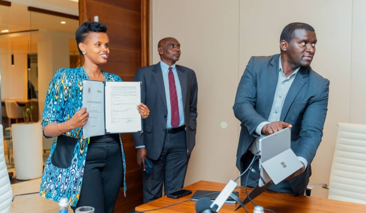 Chief Executive Officer Patricie Uwase and Jamaica’s Chief Justice Bryan Sykes during the signing ceremony in St Andrew in Jamaica. Photo courtesy