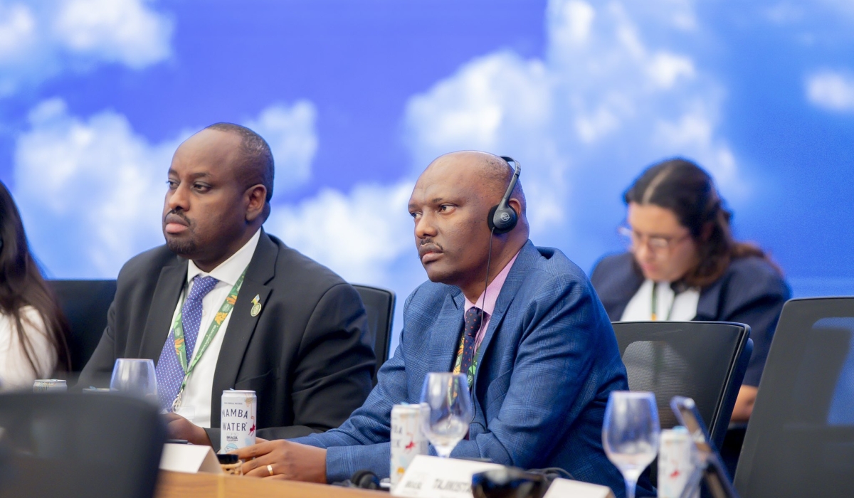 Rwanda's envoy to Brazil, Lawrence Manzi, and REMA Deputy CEO, Faustin Munyazikwiye, during COP30 in Belém, Brazil, on November 13. Courtesy