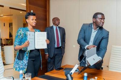 Chief Executive Officer Patricie Uwase and Jamaica’s Chief Justice Bryan Sykes during the signing ceremony in St Andrew in Jamaica. Photo courtesy