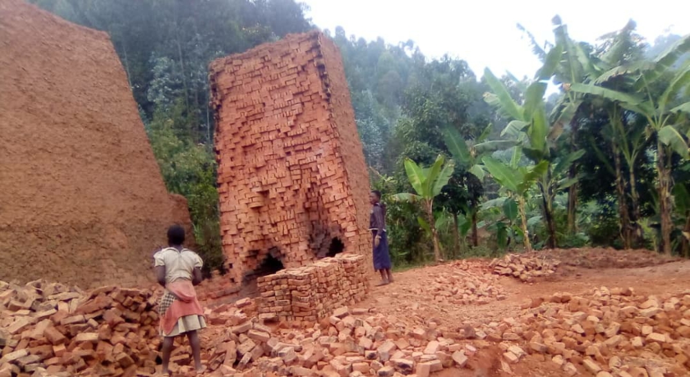 Children work at a brick collection point in Rubavu District. File