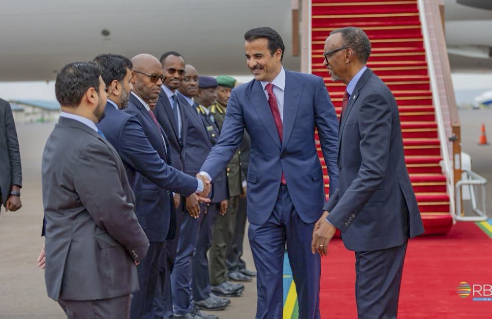 Sheikh Tamim bin Hamad Al Thani, the Emir of the State of Qatar, greets officials on his  arrival at Kigali International Airport on Thursday, November 20. Photo by RBA