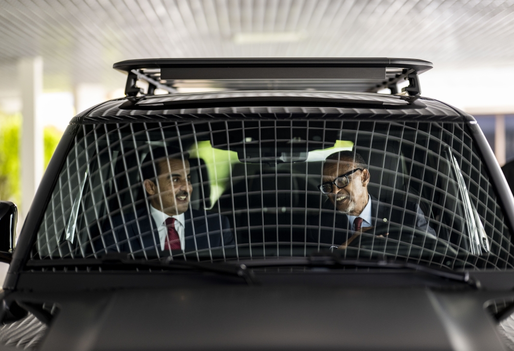 President Kagame drives with Sheikh Tamim bin Hamad Al Thani, the Emir of Qatar, after his arrival at Kigali International Airport on November 20. Photo by Village Urugwiro