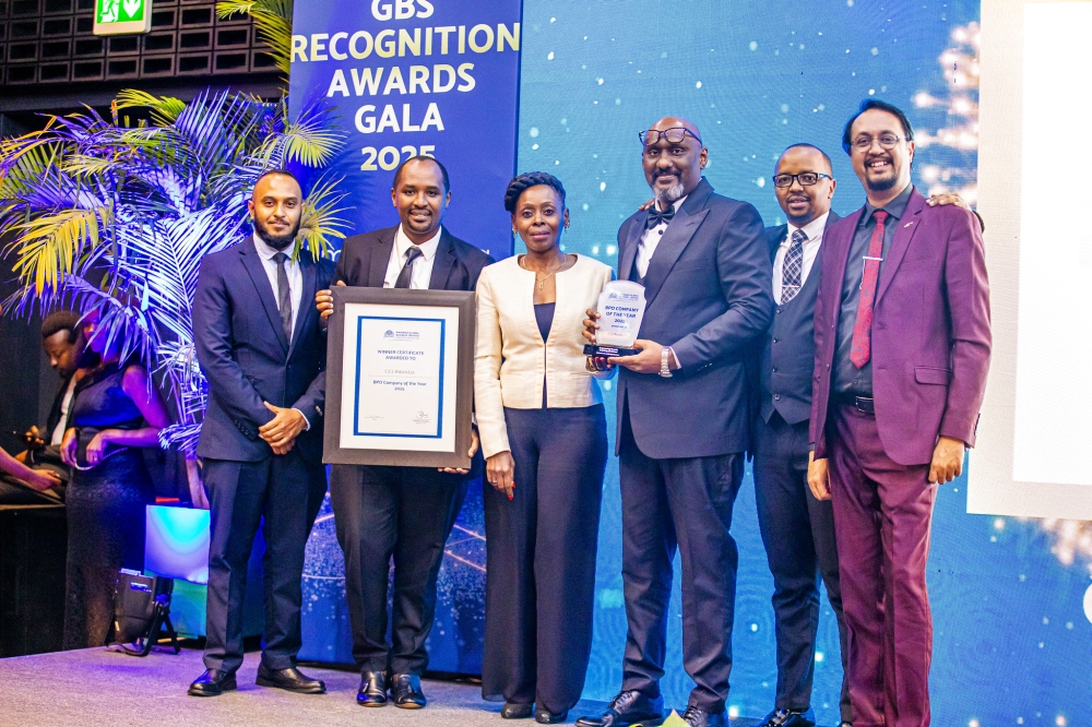 Christine Nkulikiyinka, the Minister of Public Service and Labour (C), congratulated the awardees at Mövenpick Kigali on Thursday, November 20, 2025. Photos by Kellya Keza.
