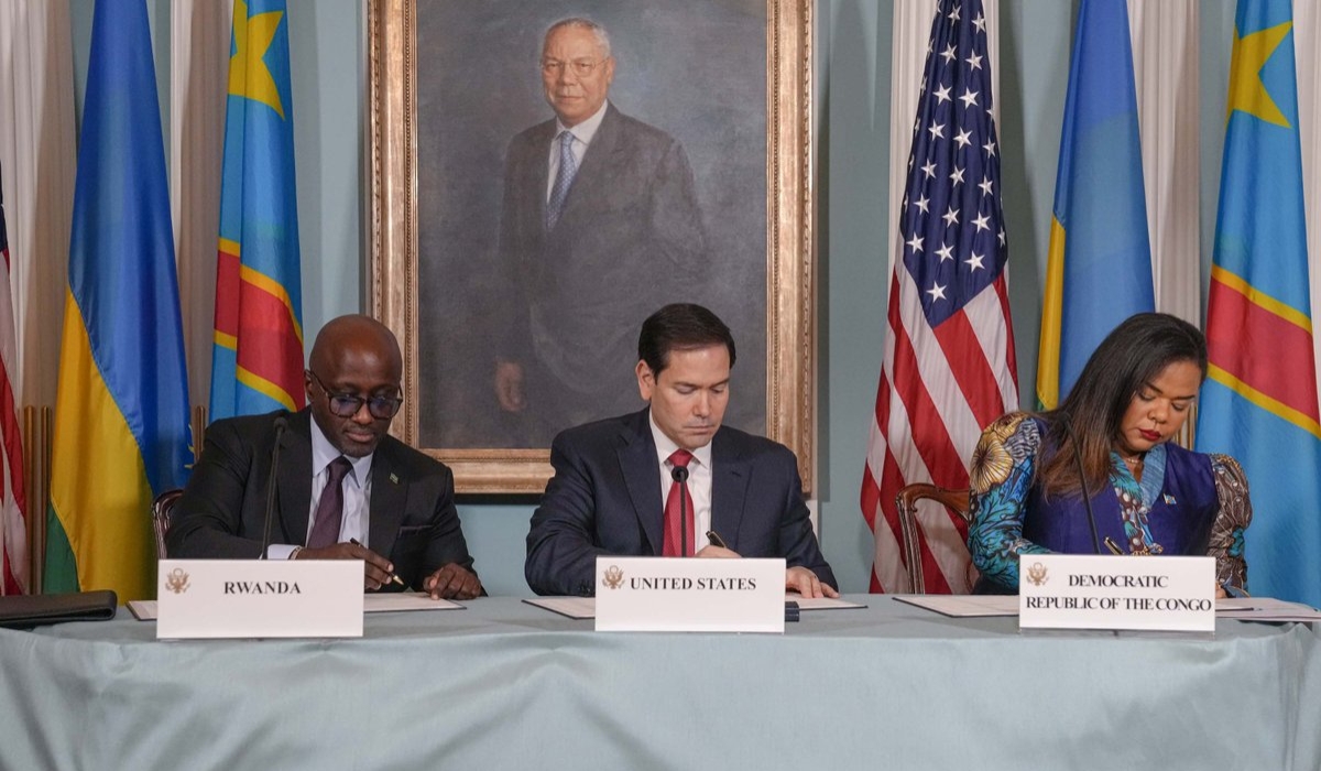 Rwandan Minister of Foreign Affairs Olivier Nduhungirehe and DR Congo’s Thérèse Kayikwamba sign the Peace Agreement between the DRC and Rwanda on June 27, 2025. The event was graced by Marco Rubio, the U.S. Secretary of State. Courtesy