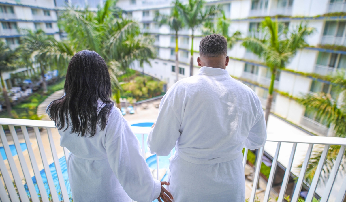 Clients pose at Radisson Blu hotel&#039;s balcon in Kigali. Radisson Blu Kigali has introduced special accommodation rates, a meeting and events discount, and spa perks available from November 22, 2025, to January 31, 2026.