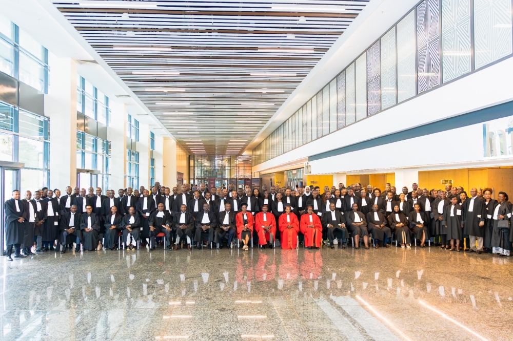 Rwanda Bar Association officials and new lawyers gather for a group photo during the swearing-in ceremony at the High Court in Kigali on Saturday.Photos by Craish Bahizi