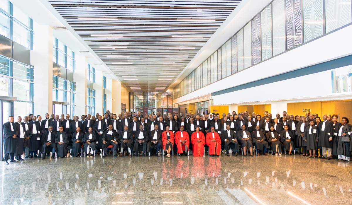 Rwanda Bar Association officials and new lawyers gather for a group photo during the swearing-in ceremony at the High Court in Kigali on Saturday.Photos by Craish Bahizi