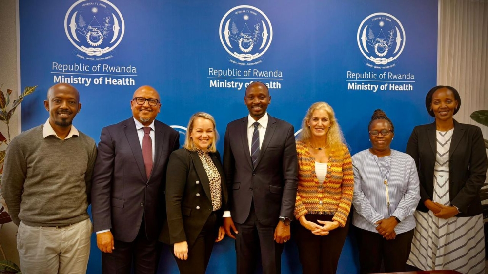 Dr. Menghis Bairu (2nd-L), the Vice Chairman of Cure Blindness Project, and Katherine Overbey (3rd-R), the CEO of the global NGO, meet with Dr. Sabin Nsanzimana (C), Rwanda’s Minister of Health, with their delegation on November 14, 2025 in Kigali. Courtesy