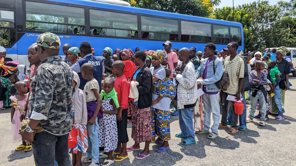 Some of the latest returnees who arrived on Monday. Photo by Germani Nsanzimana.
