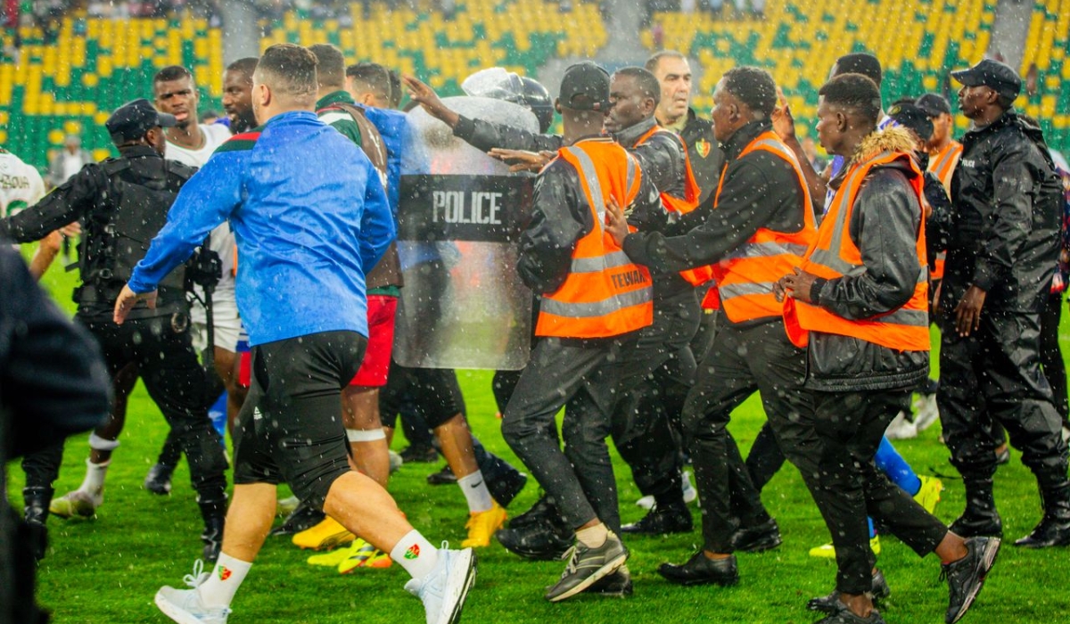 CAF will open a disciplinary case against Al Hilal and MC Alger  whose players and staff clashed on the pitch at full time during Friday&#039;s CAF Champions League group stage clash at Amahoro Stadium. Photo by Julius Ntare. 
