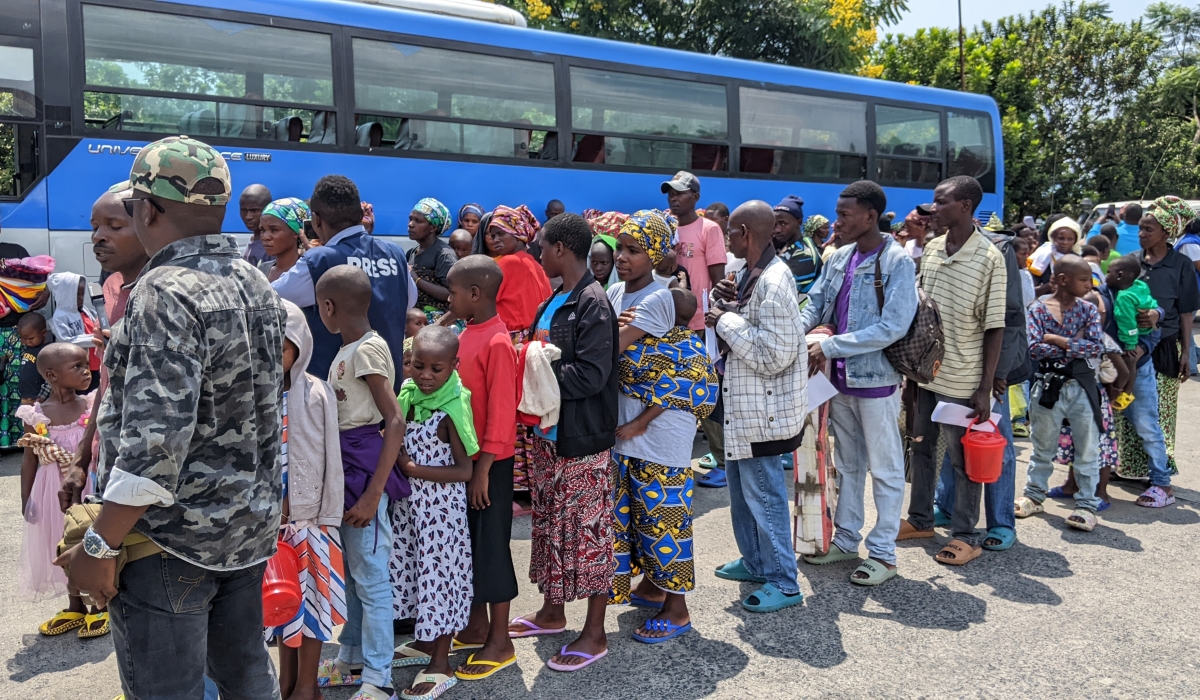 Some of the latest returnees who arrived on Monday. Photo by Germani Nsanzimana.