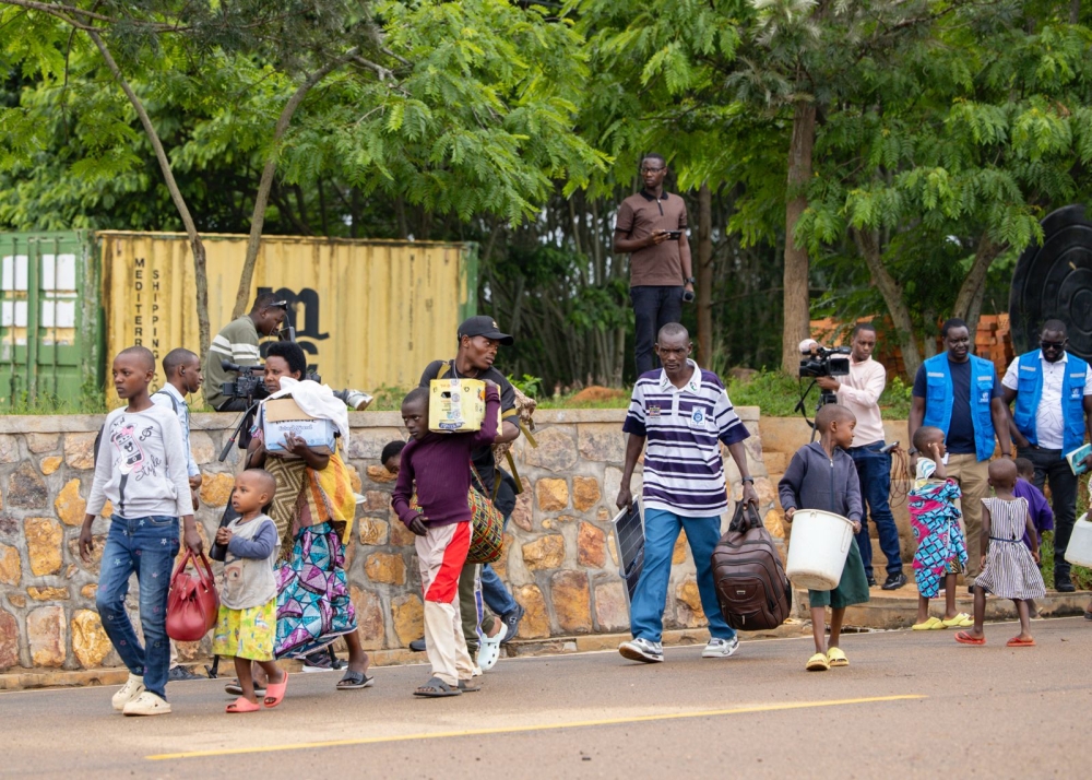Some of the refugees who were repatriated on Tuesday at the Rwanda-Burundi border.