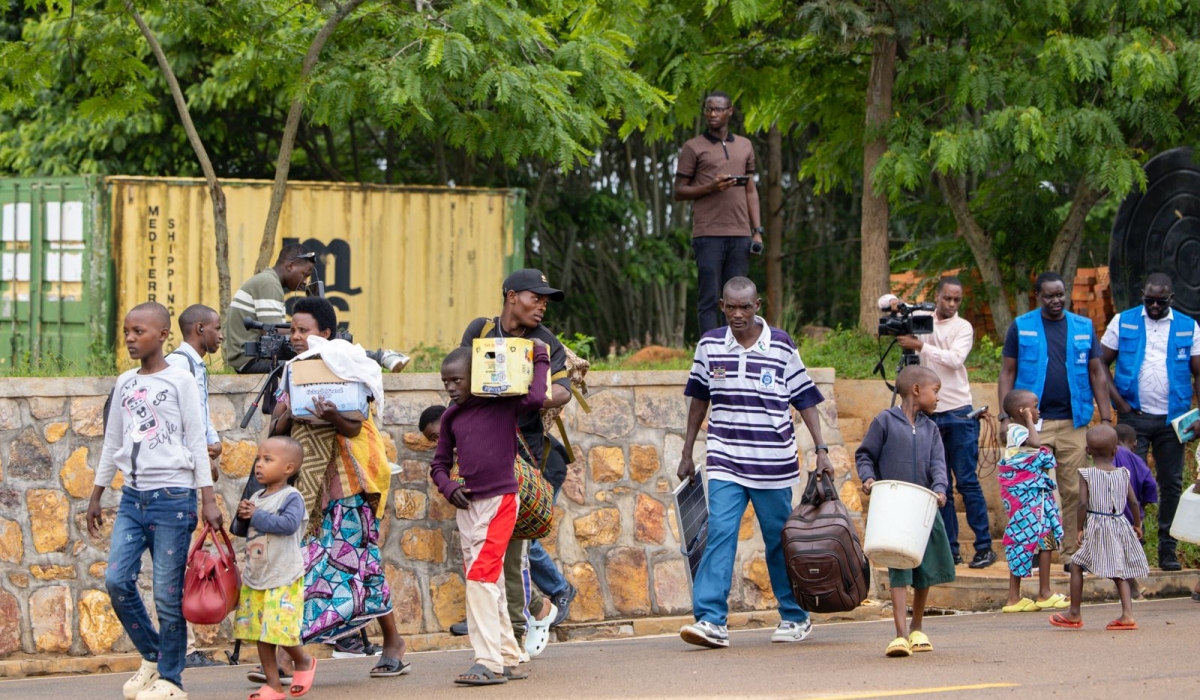 Some of the refugees who were repatriated on Tuesday at the Rwanda-Burundi border.
