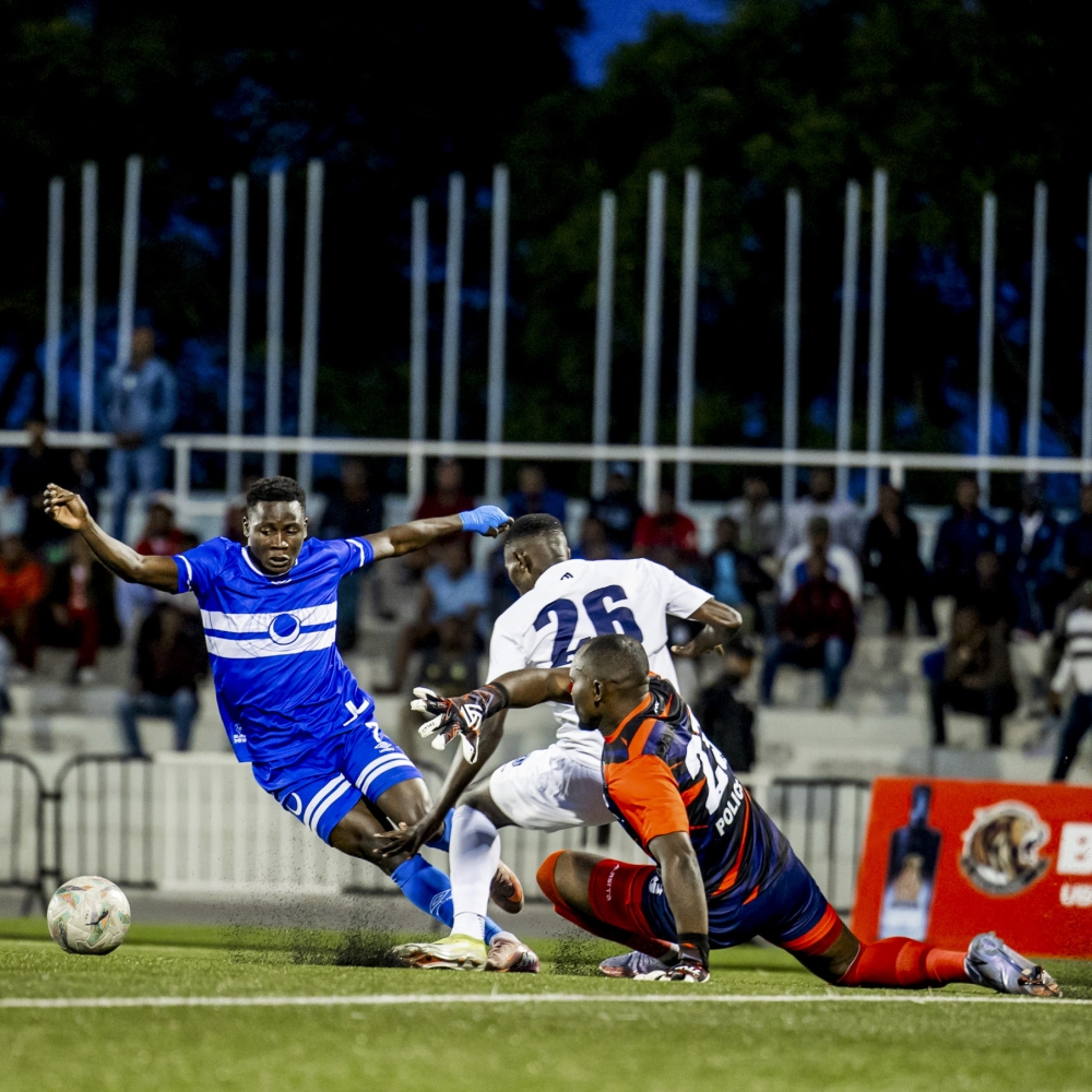 Police FC goalkeeper Onesime  Rukundo (R) and Dieudonne Ndayishimiye (#26)  deny Al Hilal&#039;s Jean Claude Girumugisha (L) from scoring in Wednesday&#039;s goalless draw at Kigali Pele Stadium. Photo Courtesy