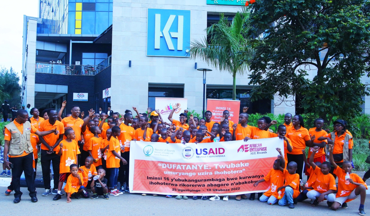 Participants pose for a group photo after completing the Anti-GBV Car-Free Day walk from BK Arena to the Kigali Convention Centre. Photo by Craish Bahizi