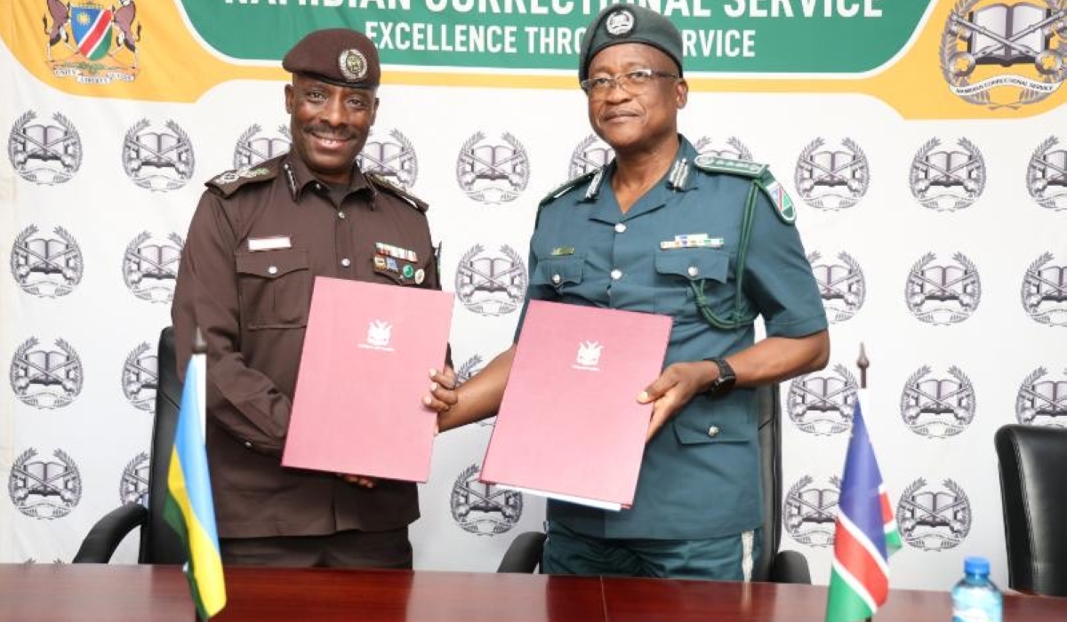 Murenzi and his Namibian counterpart Raphael T. Hamunyela after the signing. Courtesy.