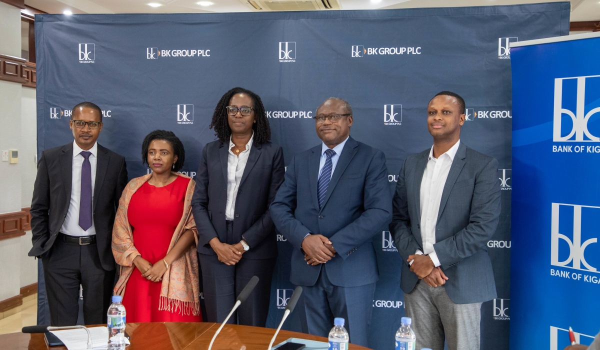 BK Group Plc officials pose for a group photo during a press conference in Kigali on November 25. Photos by Craish Bahizi.