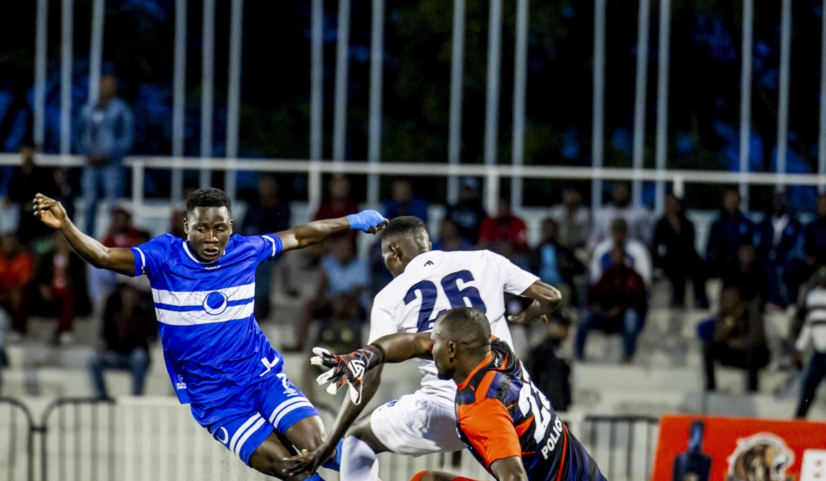Police FC goalkeeper Onesime  Rukundo (R) and Dieudonne Ndayishimiye (#26)  deny Al Hilal&#039;s Jean Claude Girumugisha (L) from scoring in Wednesday&#039;s goalless draw at Kigali Pele Stadium. Photo Courtesy