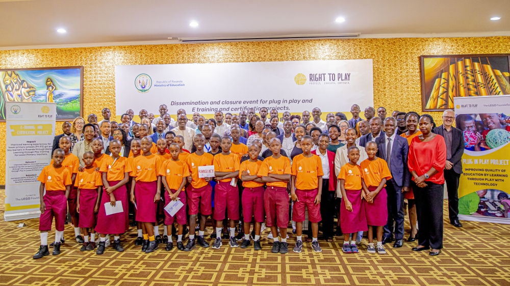 Students and other delegates pose for a group photo during the dissemination and official closure event for the Plug and Play and E-Training and Certification projects, which began in 2021 and 2022 respectively, held at Lemigo Hotel on November 26. Photo by Keza Kellya Raissa