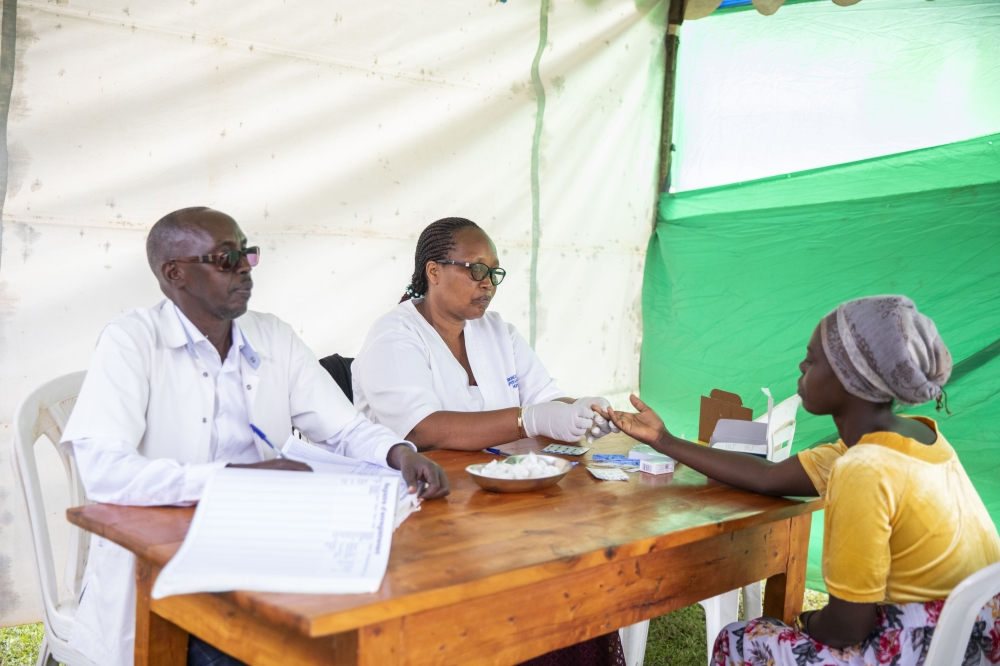 A woman takes an HIV test during an HIV prevention campaign in Gasabo in December 2024. Rwanda’s HIV programme supports nearly 230,000 people, with 96.9% on treatment one of the highest coverage rates globally. File