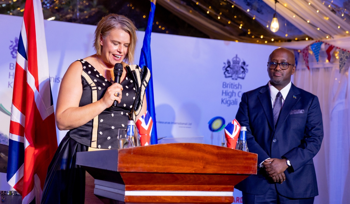 British High Commissioner to Rwanda, Alison Thorpe, standing alongside the Minister of Foreign Affairs and International Cooperation Olivier Nduhungirehe, addressing the audience at the event.