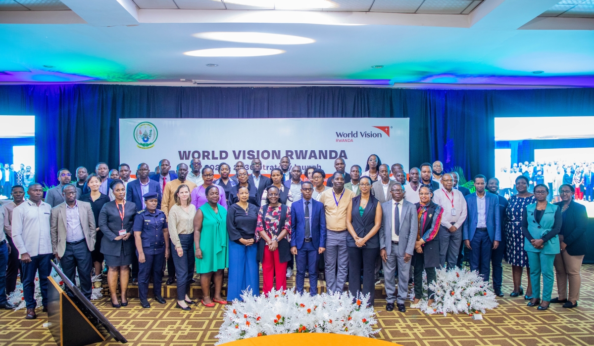 Delegates pose for a group photo during the event where World Vision Rwanda unveiled its new strategy for the fiscal years 2026–2030. Photo by Craish Bahizi.