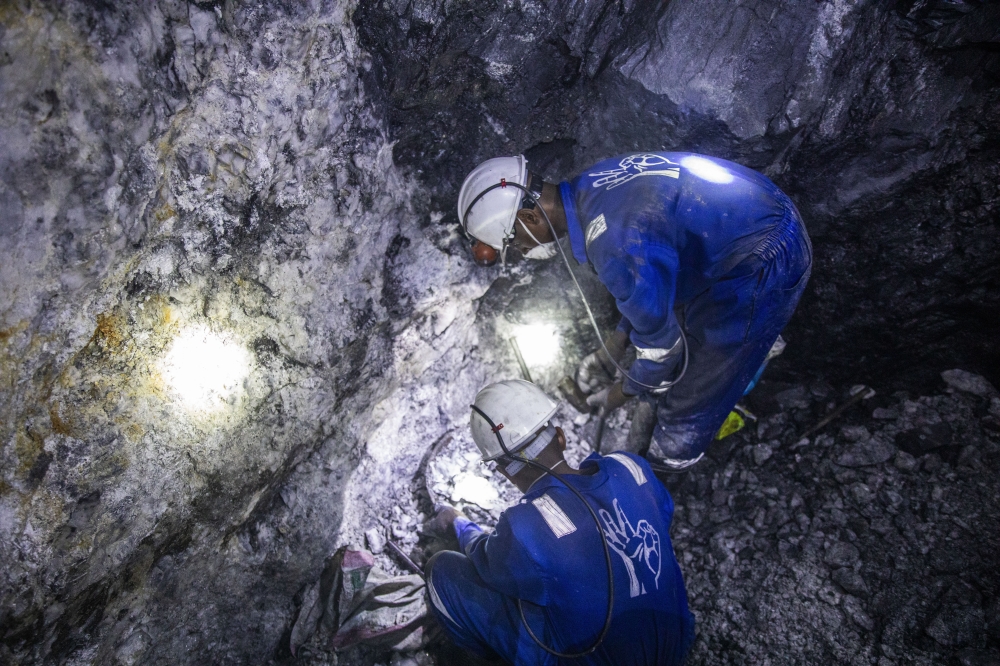 Miners work inside a tunnel at the Nyakabingo mining site in Rulindo District on March 3. Rwanda is set to launch its Mining Investment Pitch Book during the 8th edition of Rwanda Mining Week, which kicked off today and runs until December 5 at the Kigali Convention Centre. Photo by Emmanuel Dushimimana
