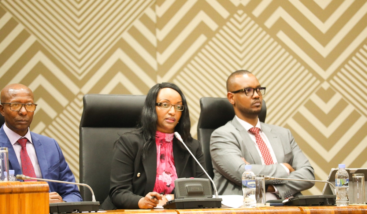 Governor of the National Bank of Rwanda (BNR) Soraya Hakuziyaremye (centre) announced, during a joint session of both chambers of Parliament on 
Monday, December 1, that the country’s digital currency trial is set to begin next year. Looking on are Mussa Fazil Harerimana, Deputy Speaker of the 
Chamber of Deputies (left) and Thierry Kalisa, Chief Economist at the Central Bank. Photo: Courtesy.