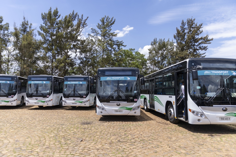 New bus parked at Kabuga bus park in Kigali in March 2023.  The government has signed performance-based agreements with private operators to provide public transport services using buses owned by Ecofleet Solutions, the newly established state-owned company. Photo by Olivier Mugwiza