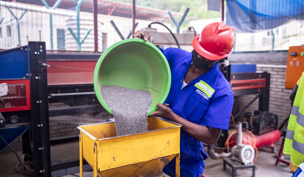 A worker at Power Resources International, a mining company in Ngororero District, takes part in the coltan production process on March 4. Coltan contains valuable elements such as niobium and tantalum. Photo by Emmanuel Dushimimana